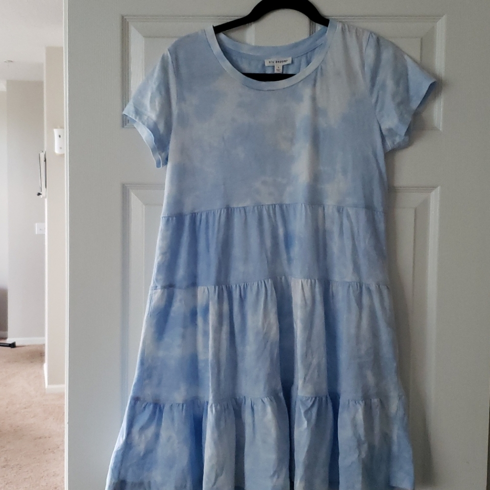 This is a baby blue and white tie dye babydoll